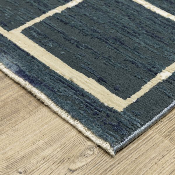 Oriental Weavers Reed RE04B Blue Ivory Contemporary Power-Loomed Rug on Sale